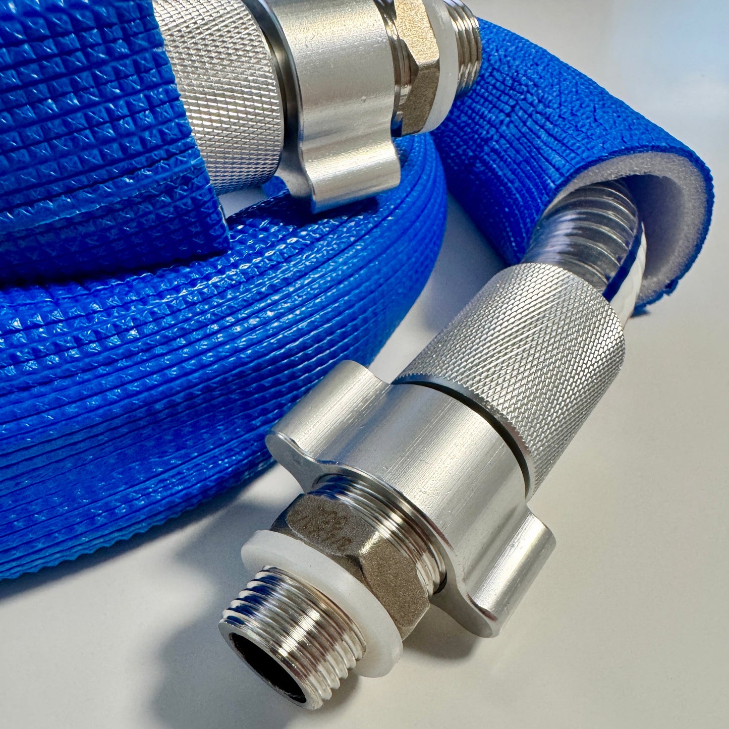 Steel braided clear hoses with condensation sleeves